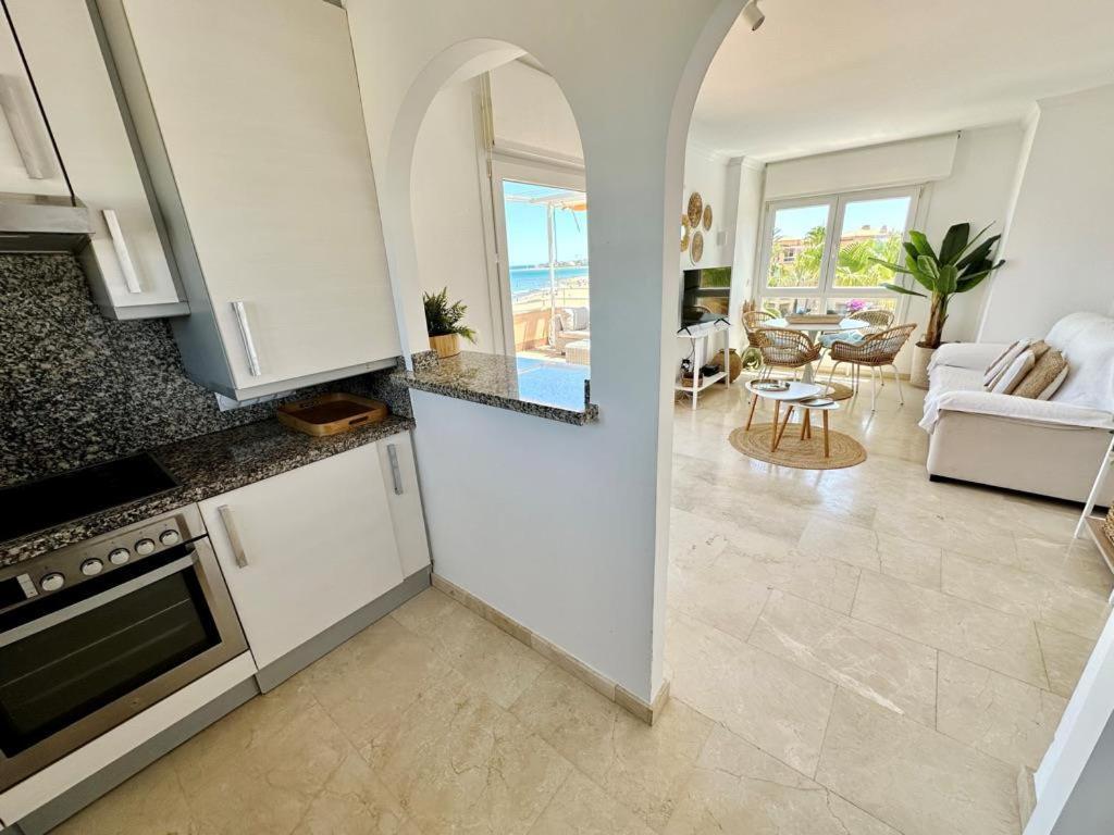 Atico Frontal Al Mar Con Piscina Privada By Homeprive Denia Bagian luar foto