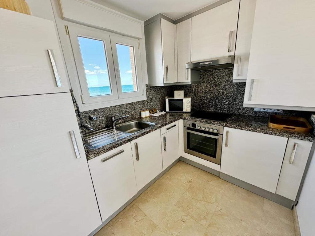 Atico Frontal Al Mar Con Piscina Privada By Homeprive Denia Bagian luar foto